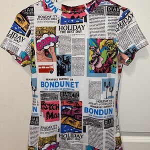 Newspaper graphic tee.